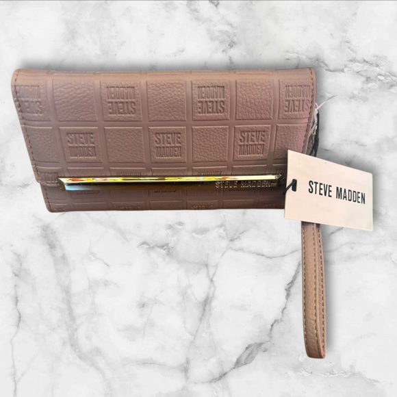 Steve Madden Handbags - ***SOLD****Steve Madden Tan Embossed Wristlet